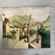Signed watercolor of landscape with bell tower