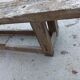 Wooden carpenter's workbench with iron and wooden vice