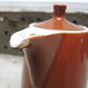 Old brown ceramic coffee maker