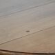 Antique English drop-leaf dining table made of walnut with elegant legs