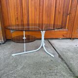 Oval smoked grey glass coffee table with white metal legs - 1990s vintage style.