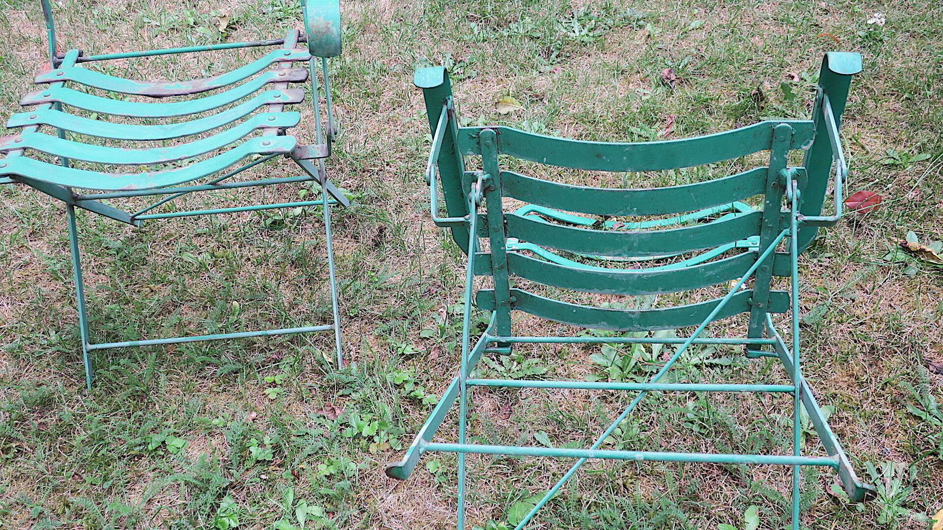 Pair of mid century distressed painted iron garden chairs