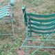 Pair of mid century distressed painted iron garden chairs