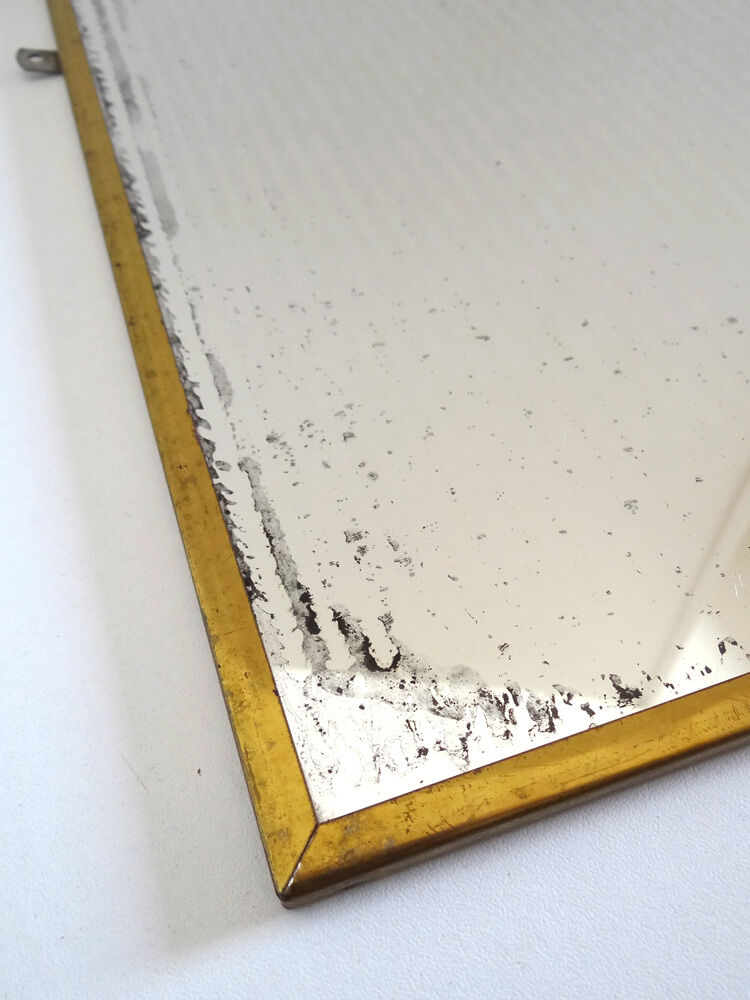 Miroir en métal doré 36 x 34 cm