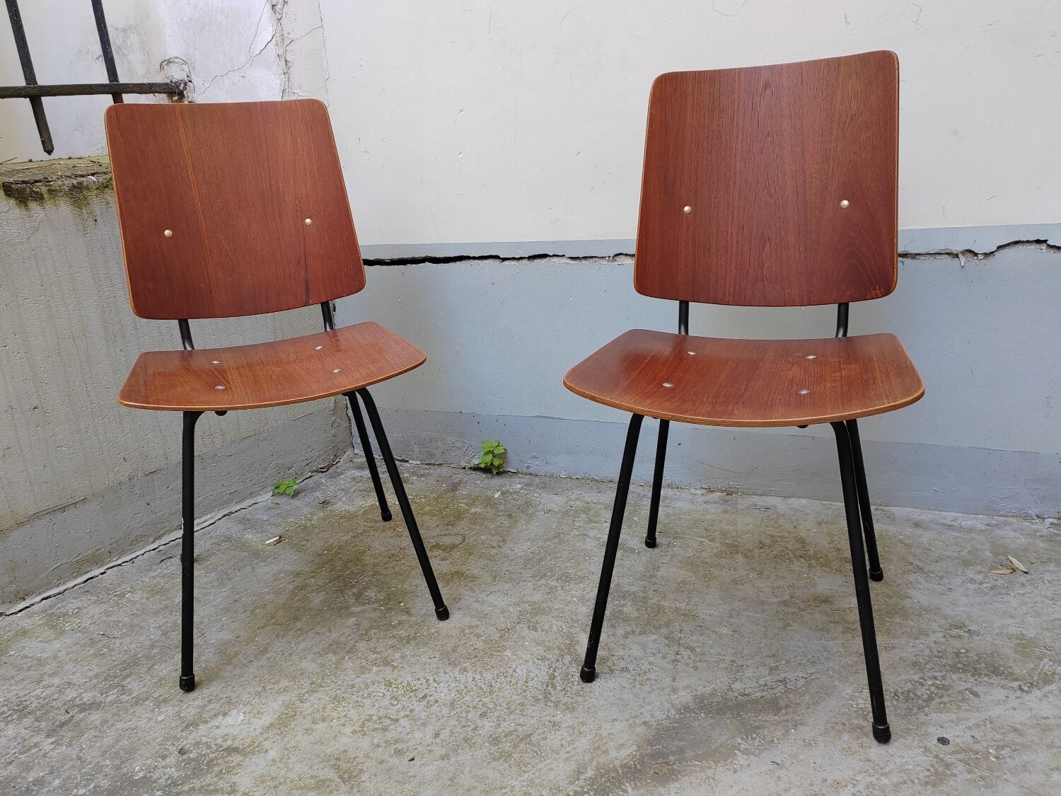 Pair of metal and teak chairs