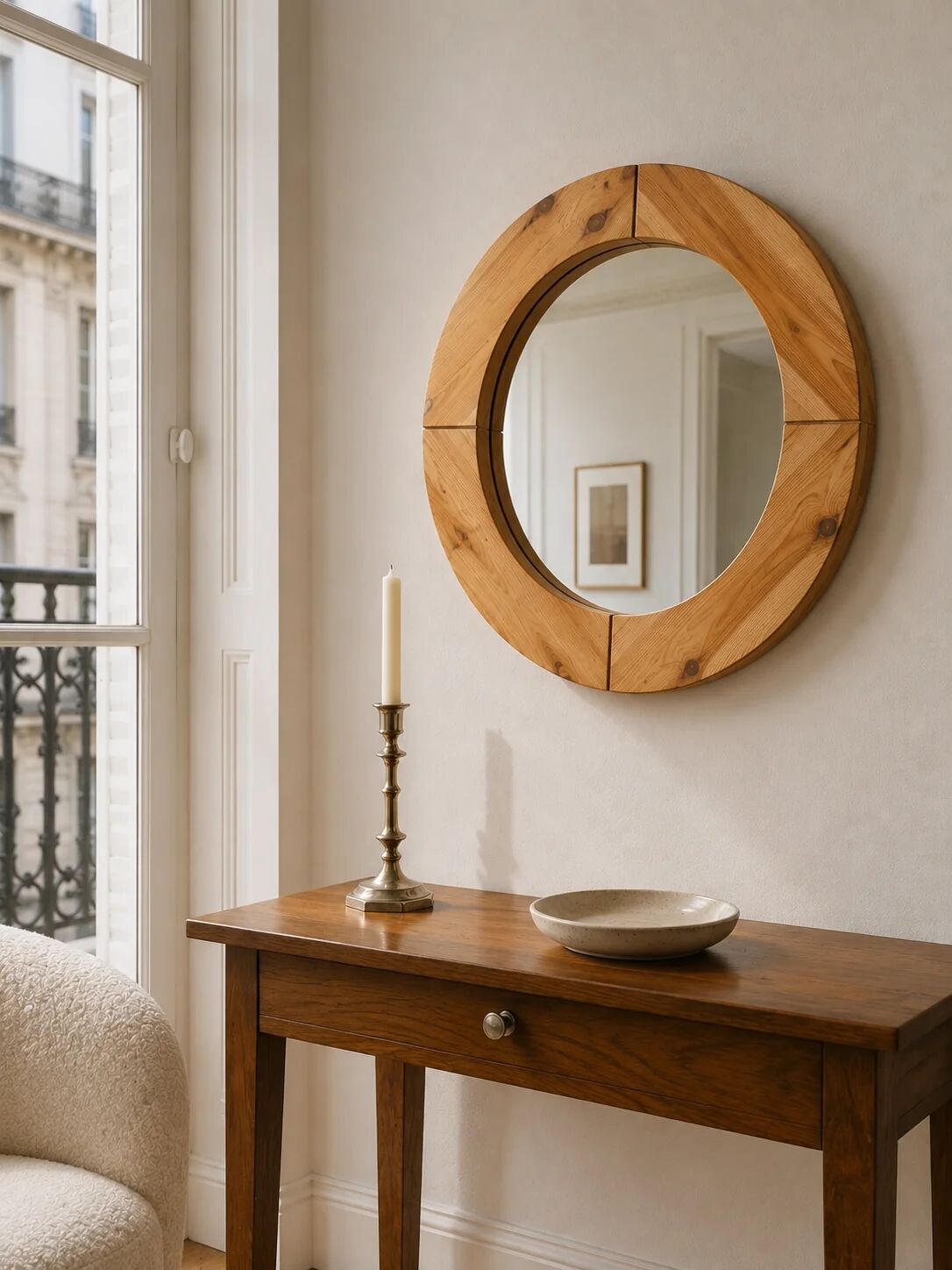 Round mirror in raw wood
