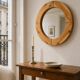 Round mirror in raw wood