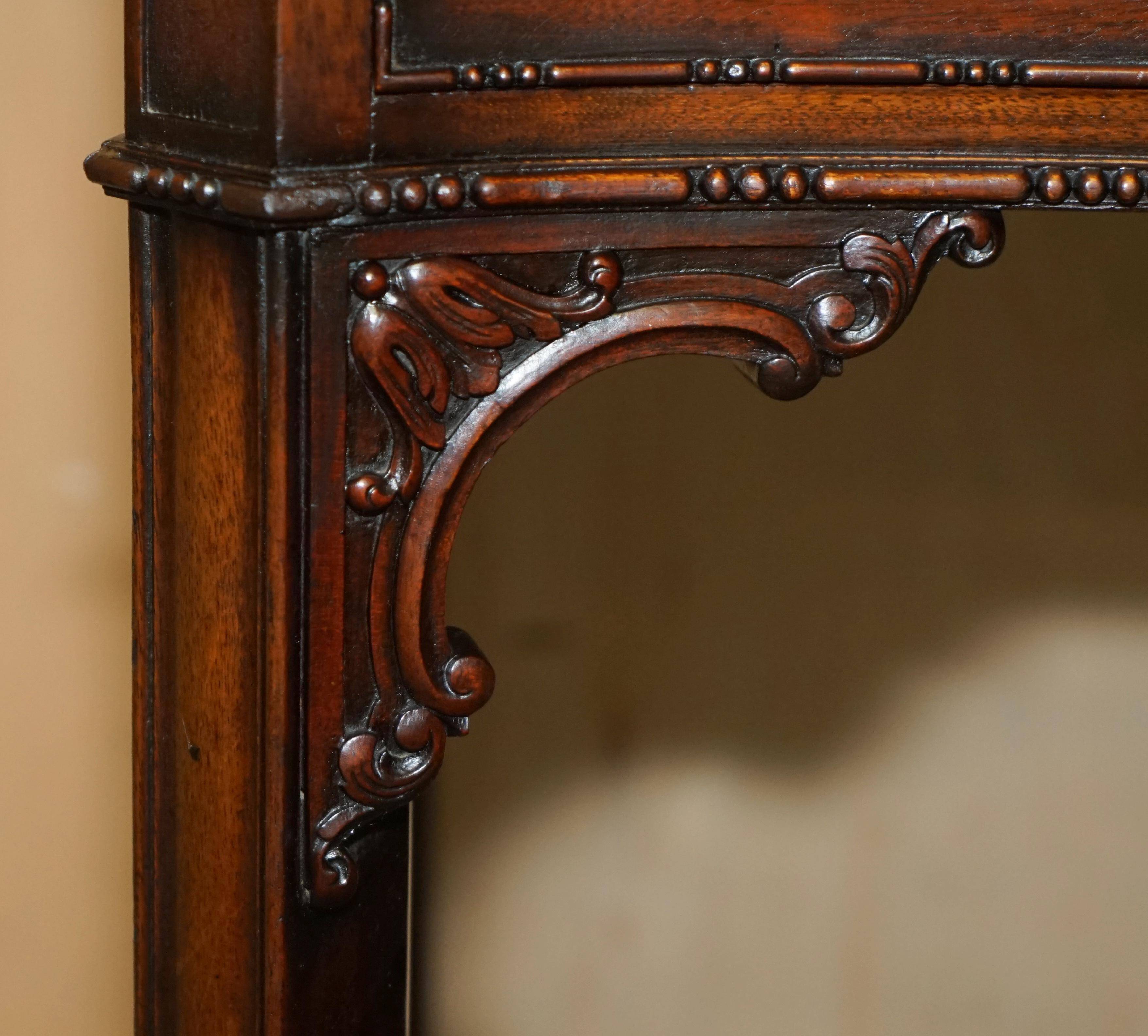 WARING & GILLOW library desk in the style of Thomas Chippendale with a leather top.