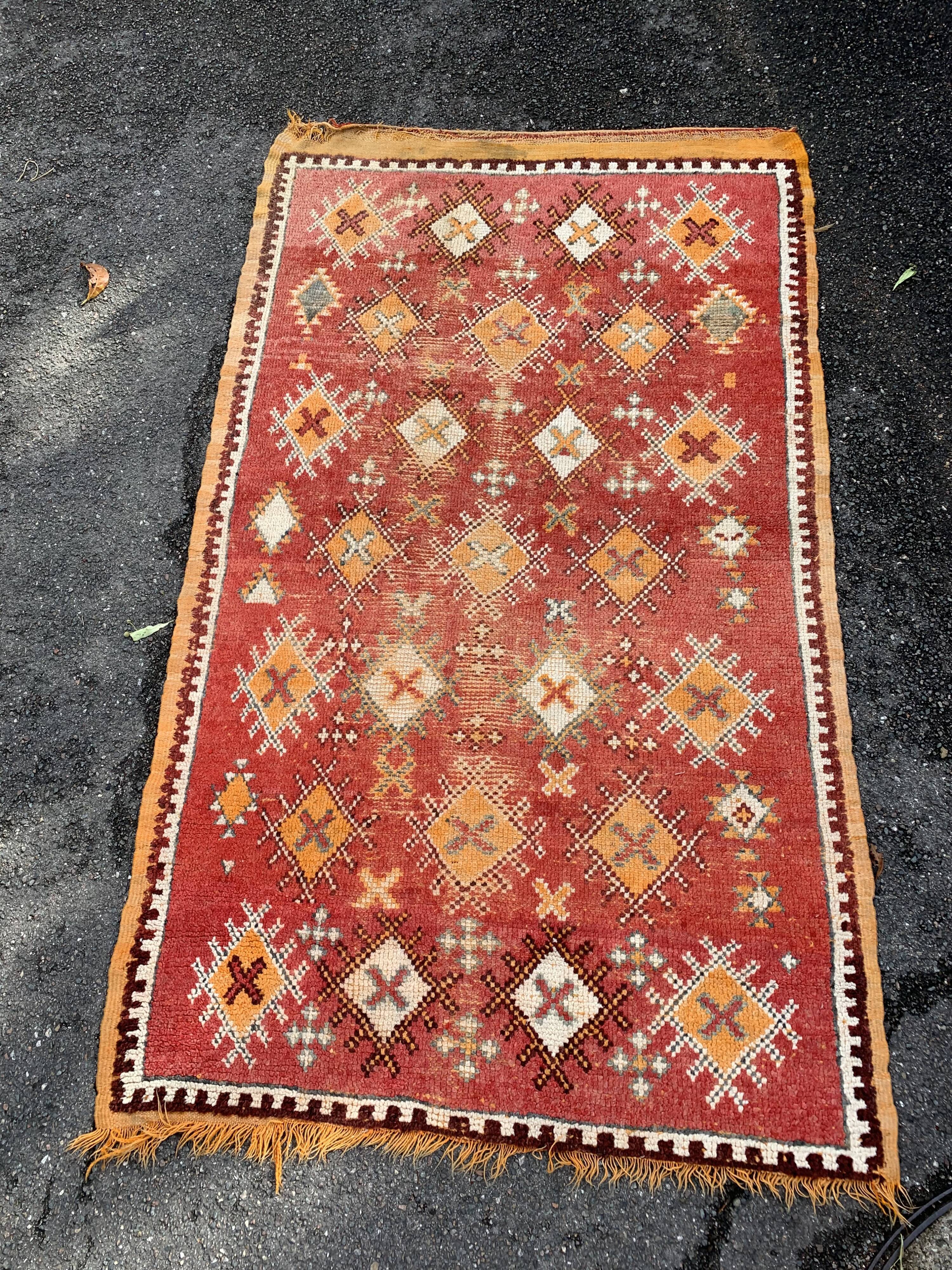 Old orange kilim carpet