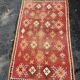 Old orange kilim carpet
