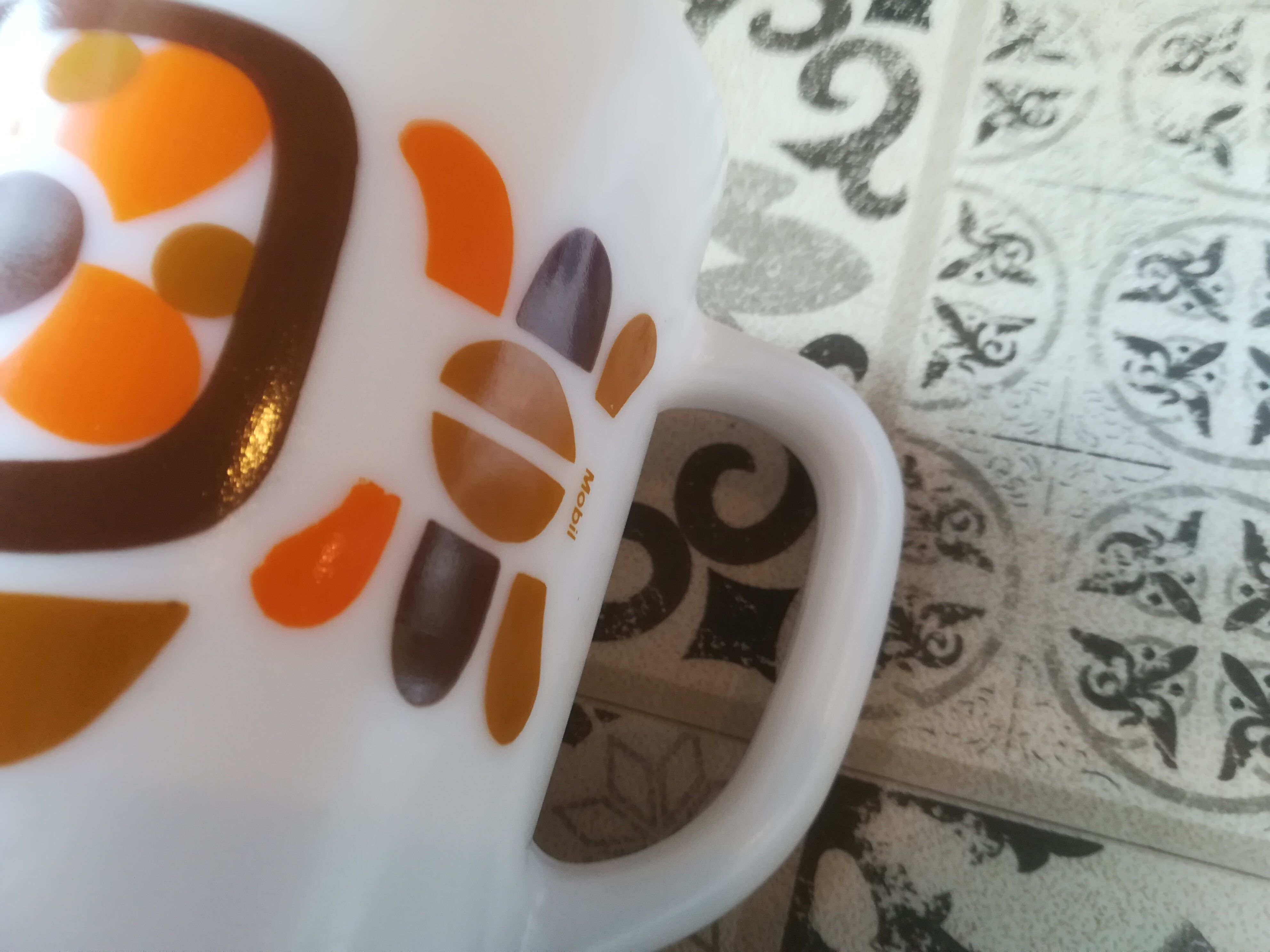 Mobil mugs and vintage pitcher in arcopal