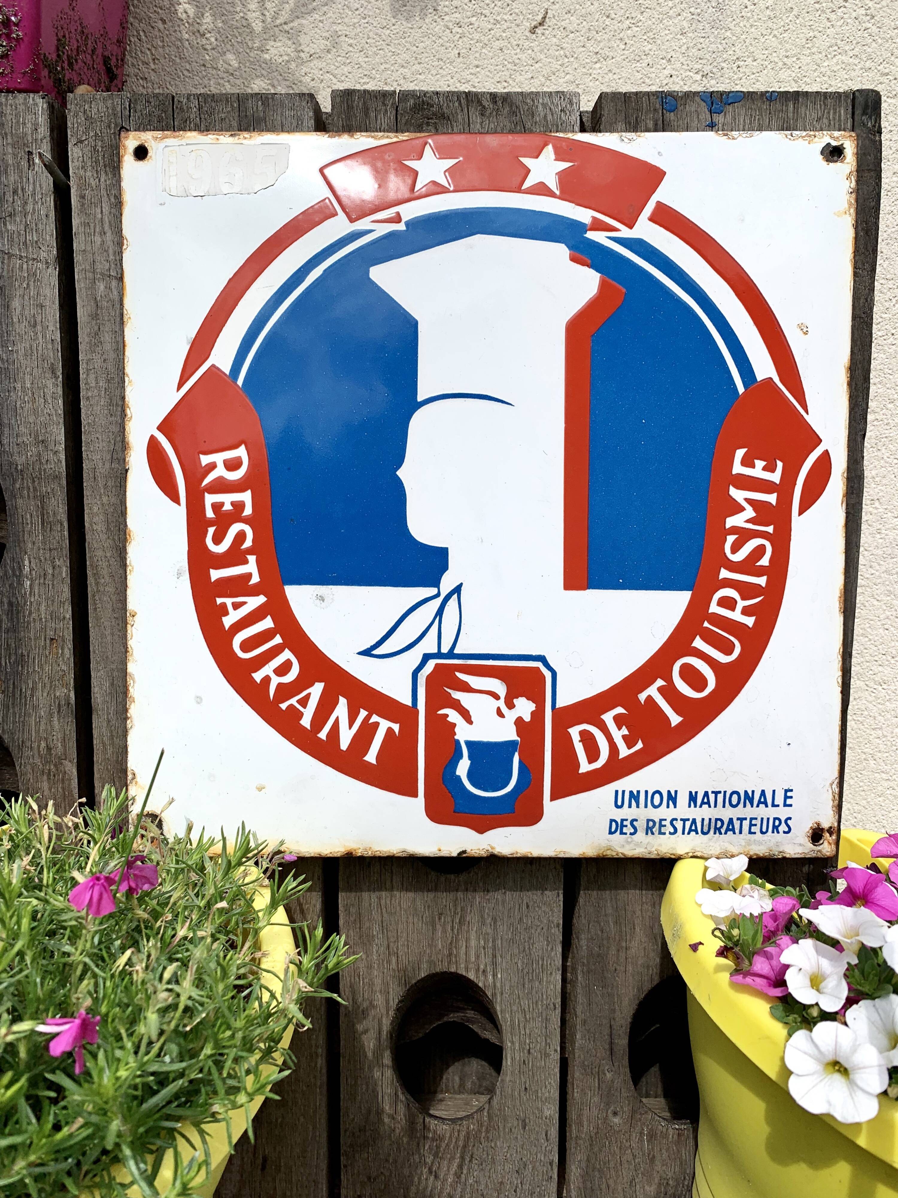 Old enamelled plate tourist restaurant