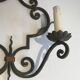 Paire d'importantes appliques décoratives en fer forgé