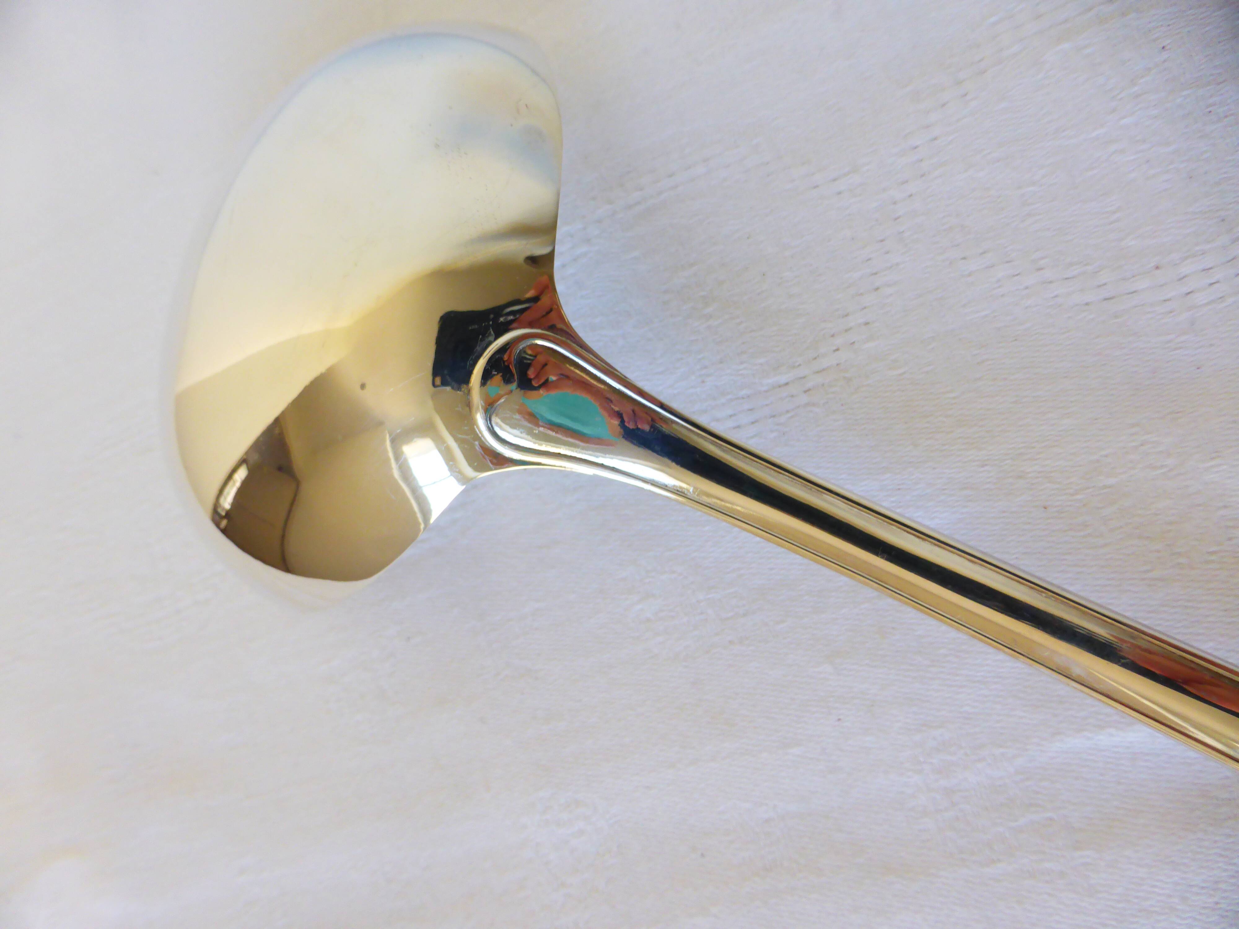 1 silver-plated metal ladle stamped 2106248