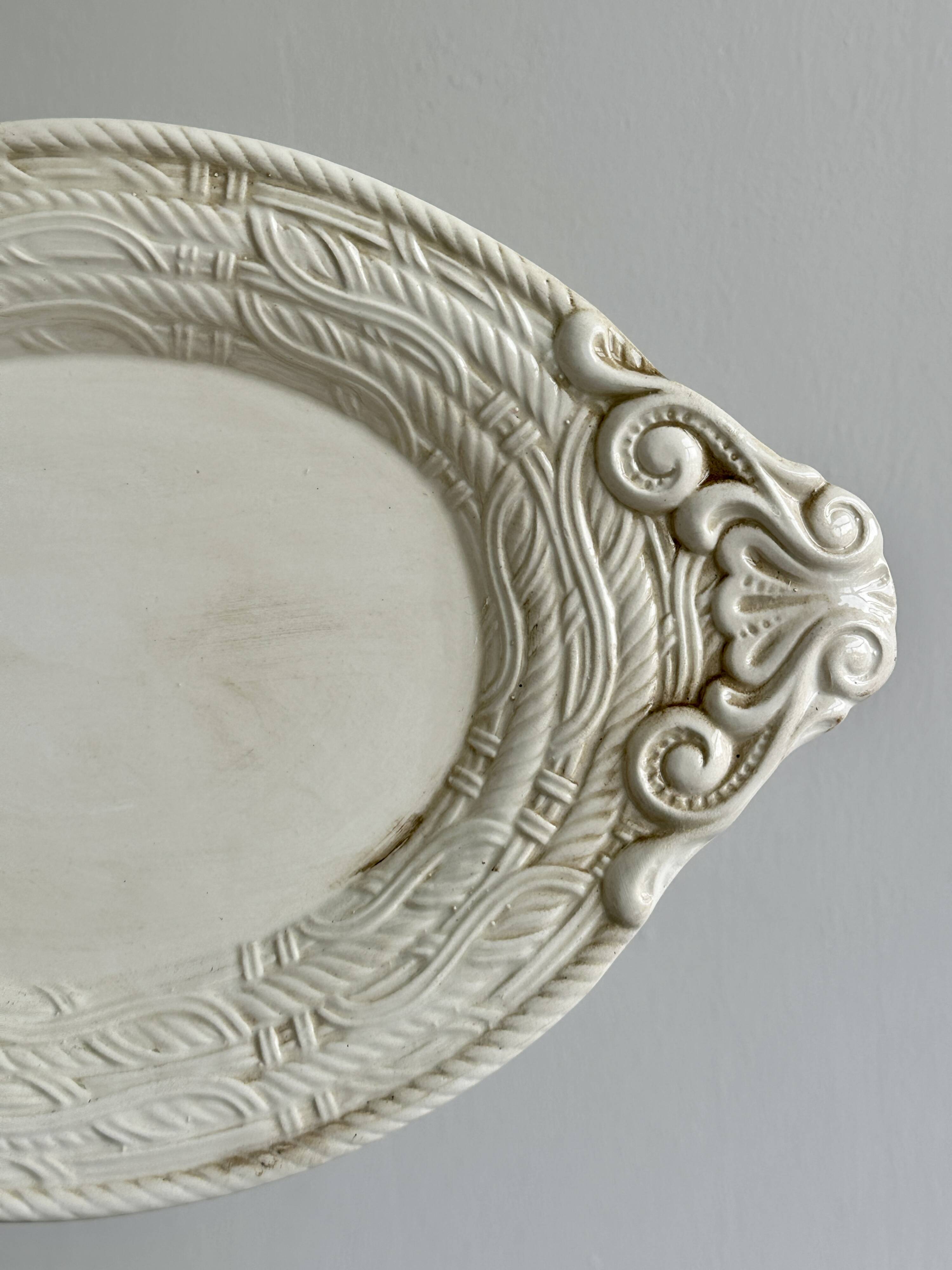 Large oval dish in sculpted white ceramic
