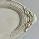 Large oval dish in sculpted white ceramic