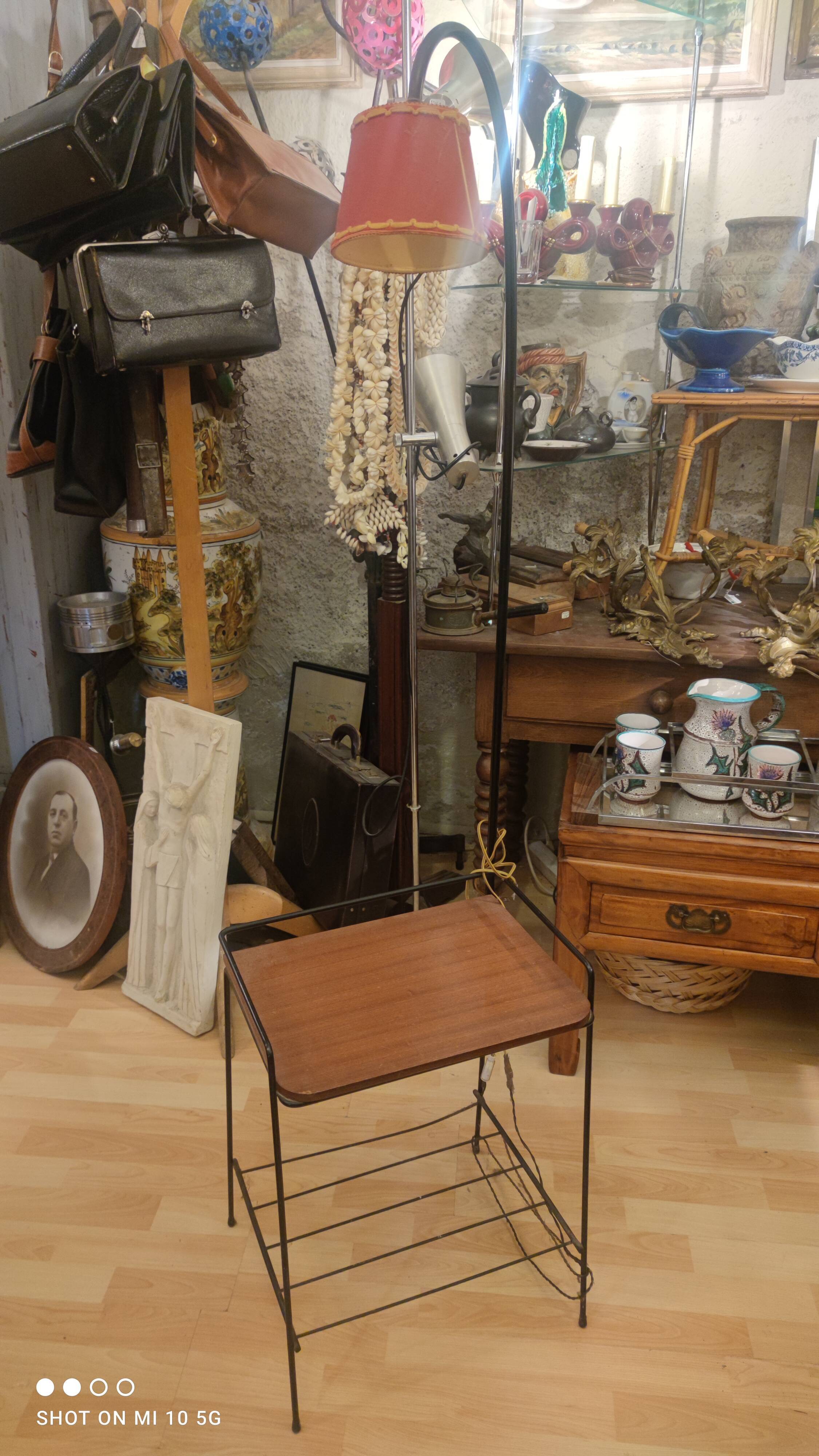 Wrought iron and mahogany floor lamp, circa 1950