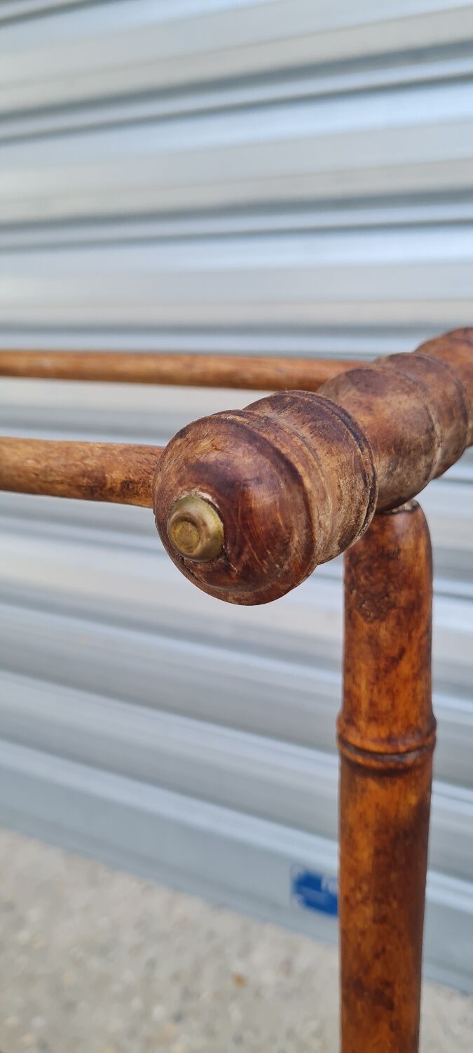 Turned wooden towel rack