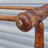 Turned wooden towel rack
