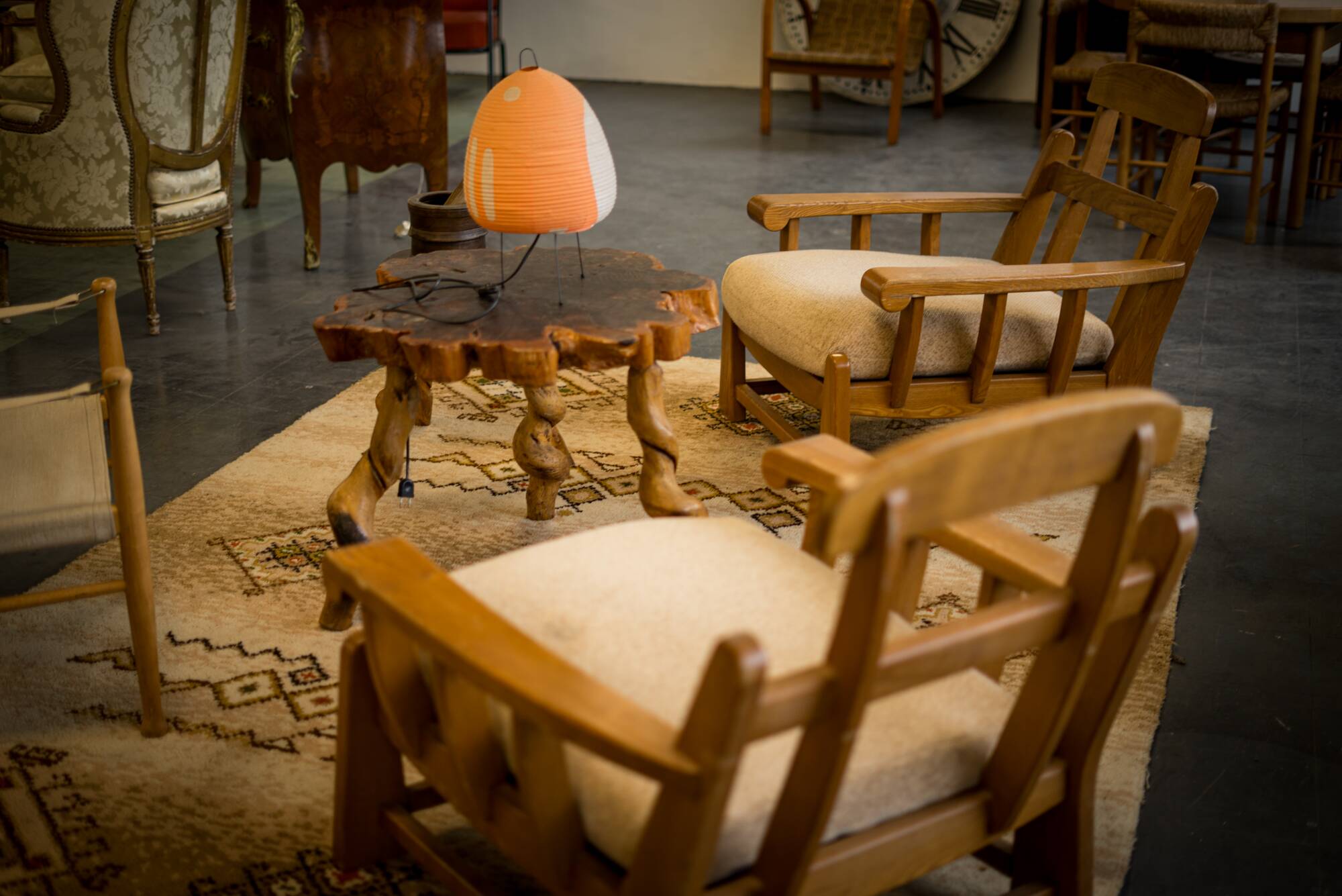 Armchairs in elm published by Maison Regain 1980