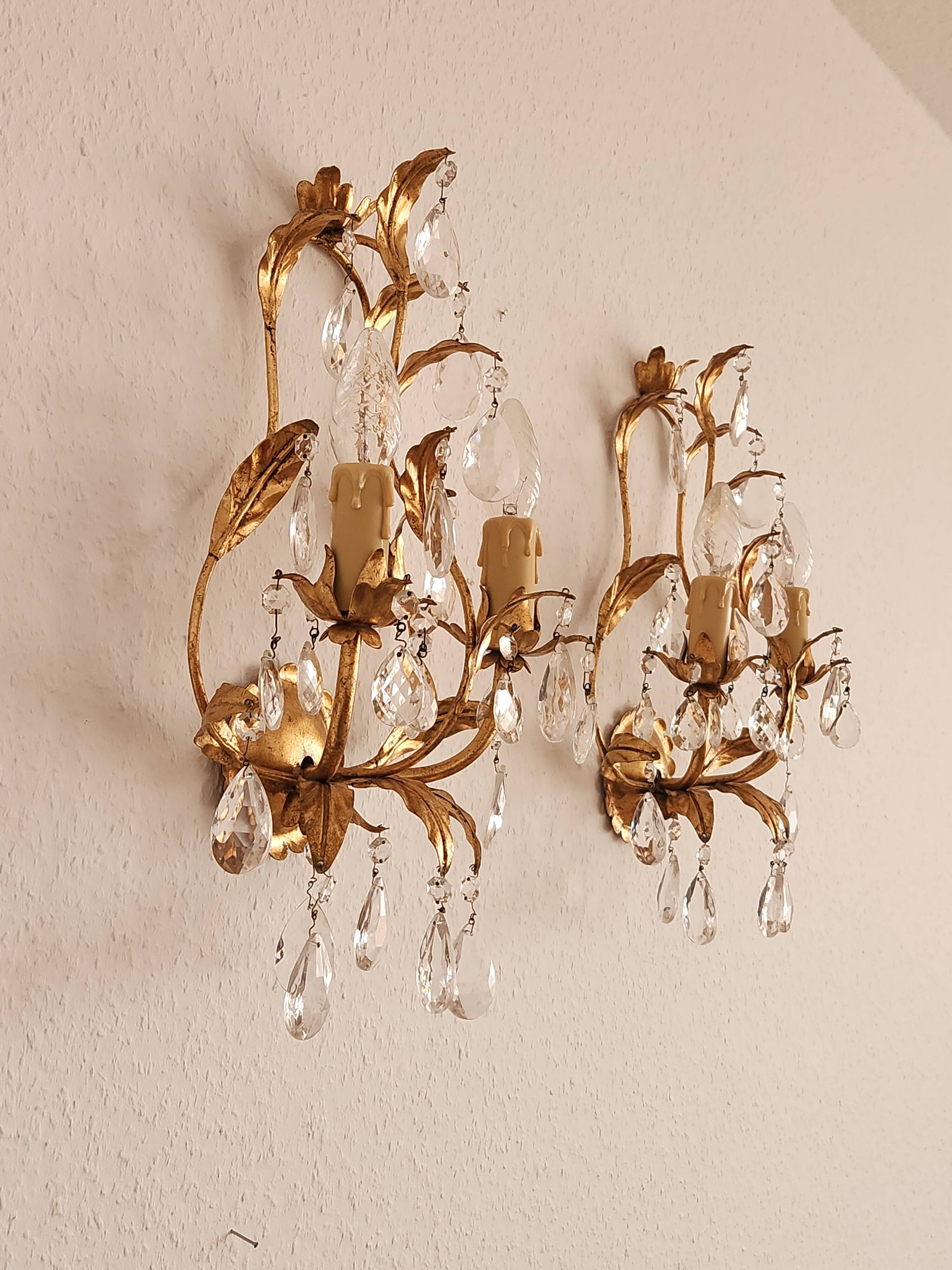Hand-forged wall lamp gilded with gold leaf and crystals, Italy