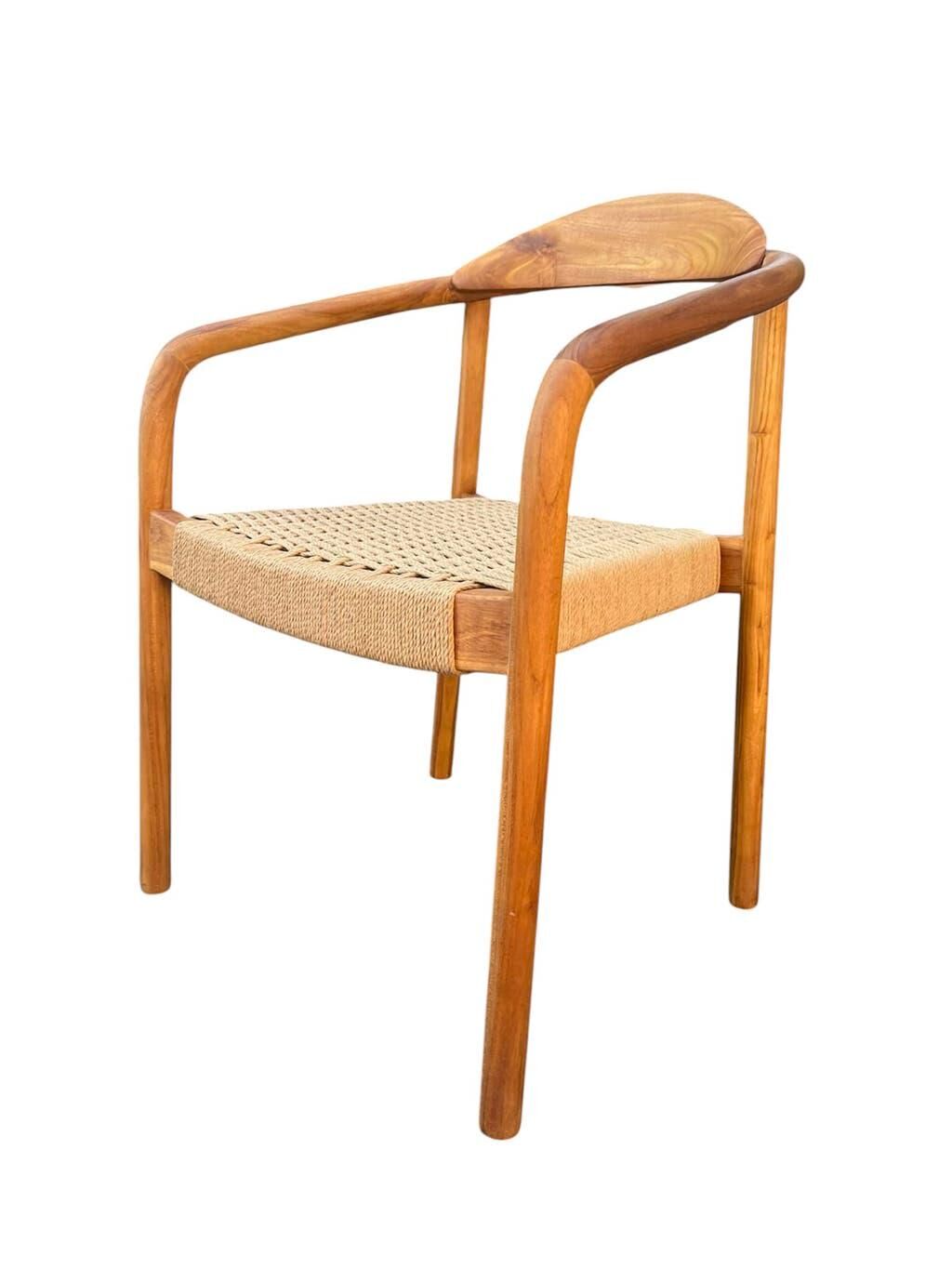 Set of 4 solid wood chairs with cord and armrests.