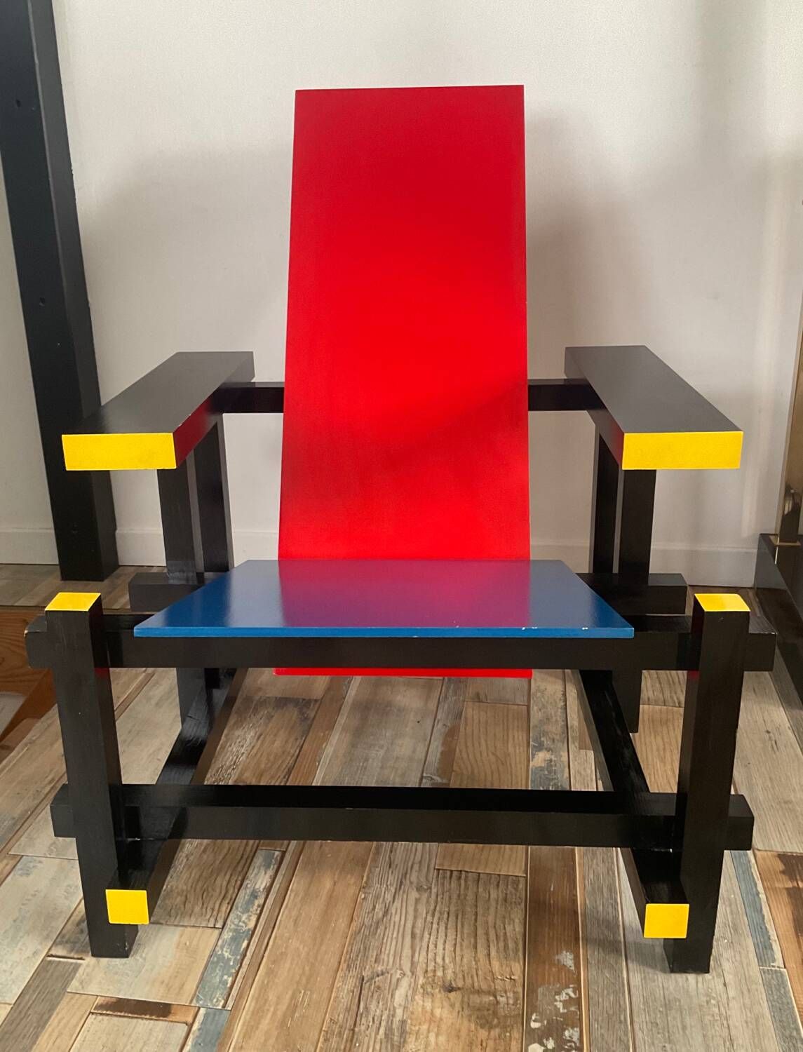 “Red and blue” lounge chair in the style of Gerrit Rietveld