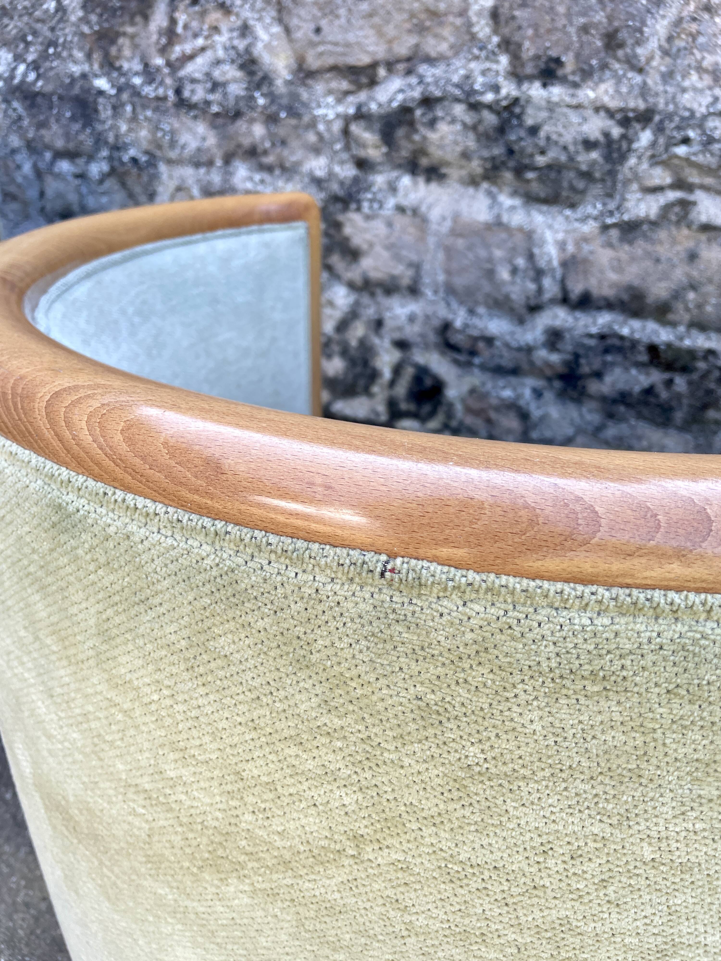 Pair of barrel-shaped armchairs in beech and almond green velvet by Maison Rosello
