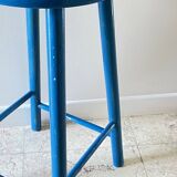 Vintage wooden stool with electric blue paint