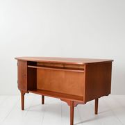 Scandinavian oval desk in teak from the 1960s.