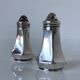 Antique salt and pepper shakers in solid English silver