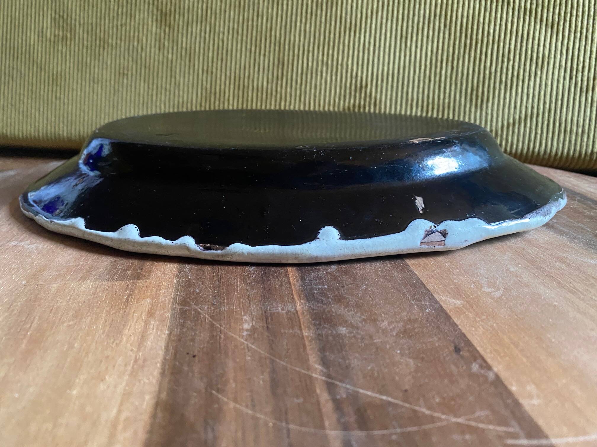 Ceramic plate, antique late 19th - early 20th century, known as "Cul-noir" from Normandy.