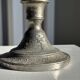 Small antique candle holder engraved in silver-plated metal, in its original condition.