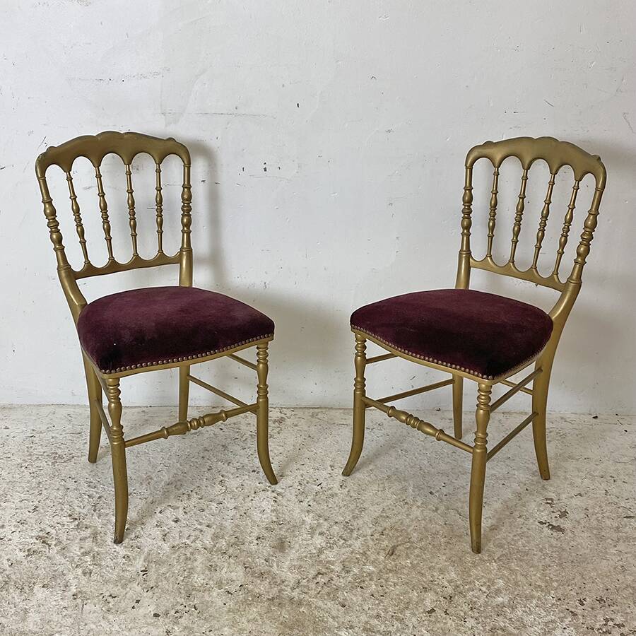 Pair of charivari chairs in gilded wood