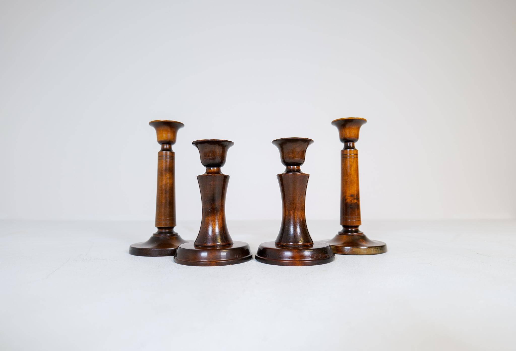 Mid-century set of 4 birch candlesticks by Carl Malmsten, Sweden, 1960s.