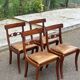 4 Regency chairs in solid wood and brown-beige leather from the 19th century.