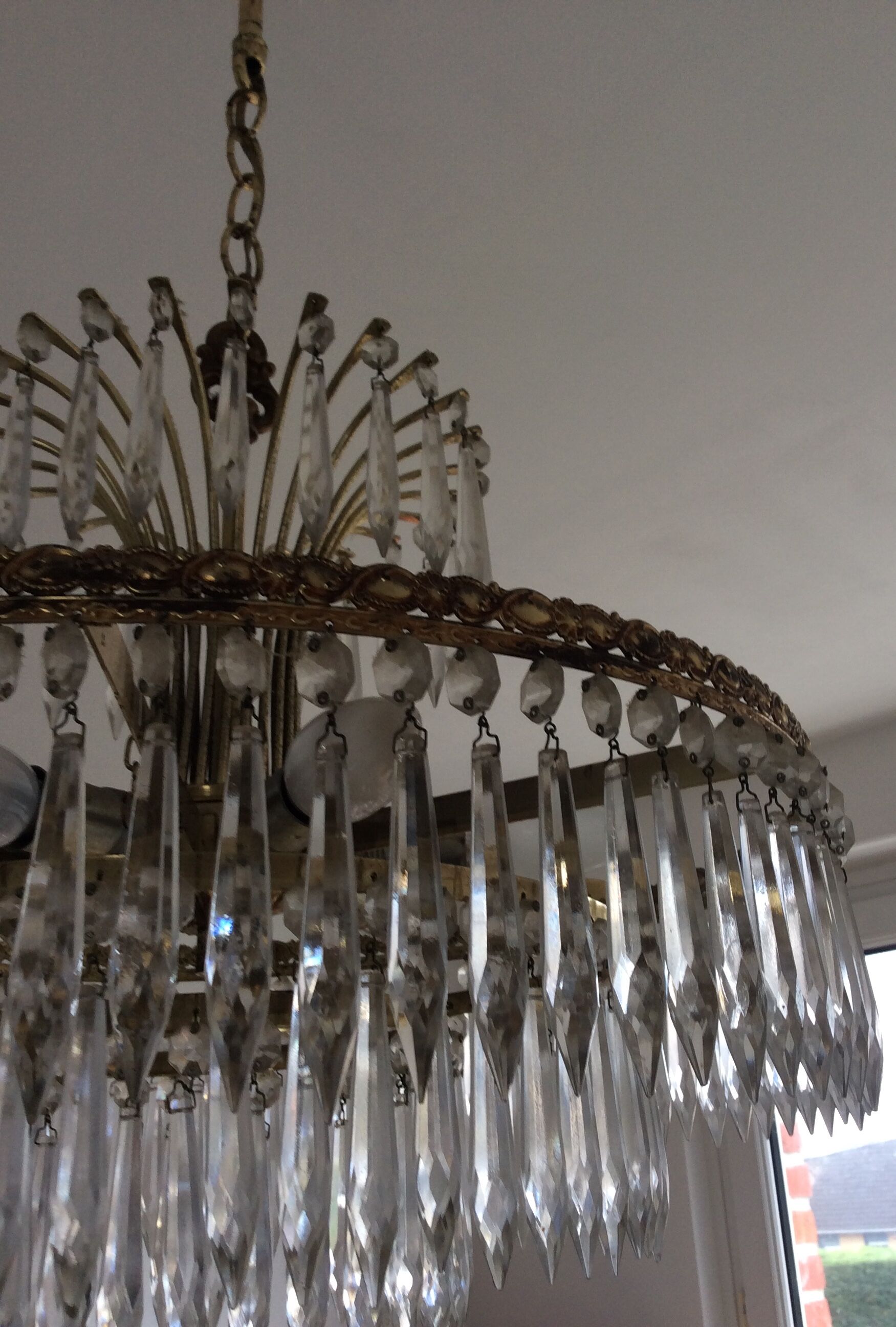 Old waterfall chandelier with grapevines and bronze