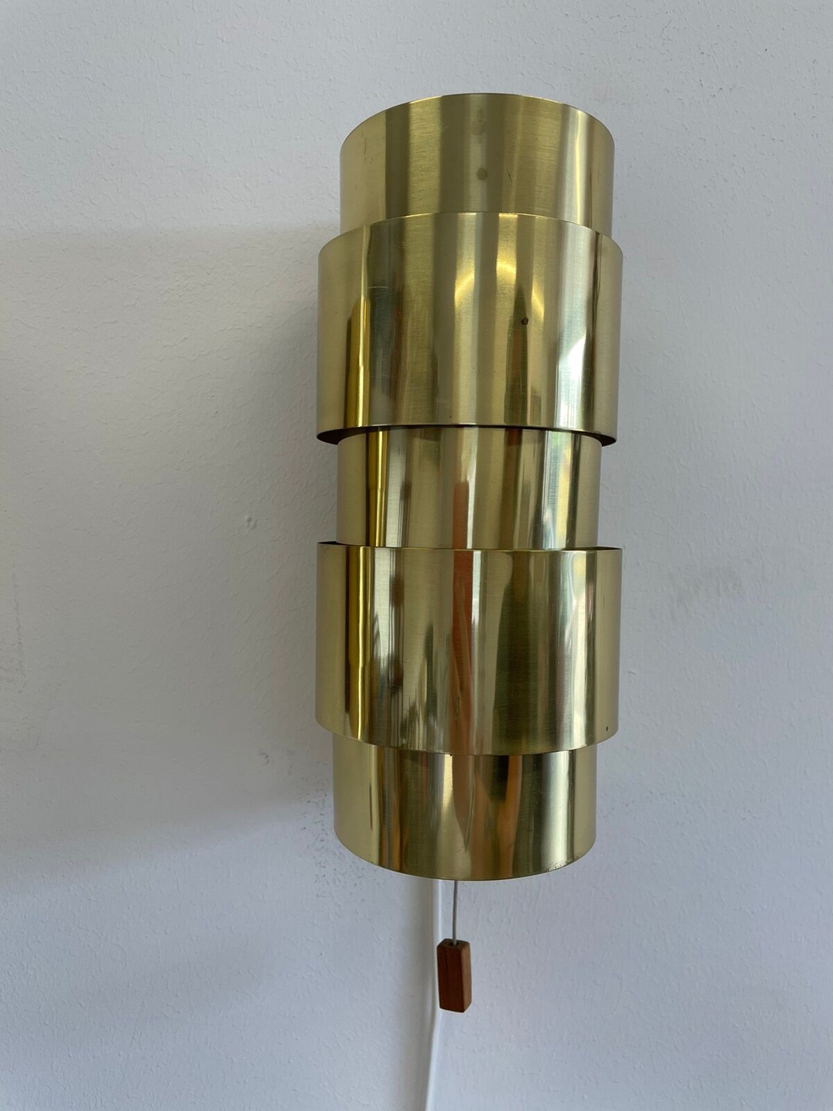 Pair of Scandinavian teak and brass sconces