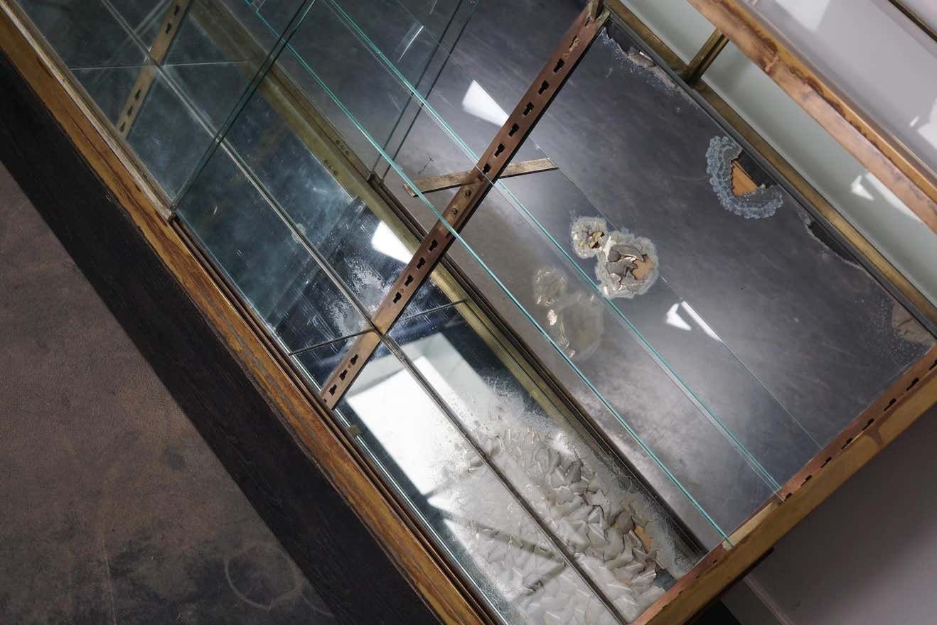 Counter or shop window in oak glass and brass France around 1920