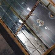 Counter or shop window in oak glass and brass France around 1920