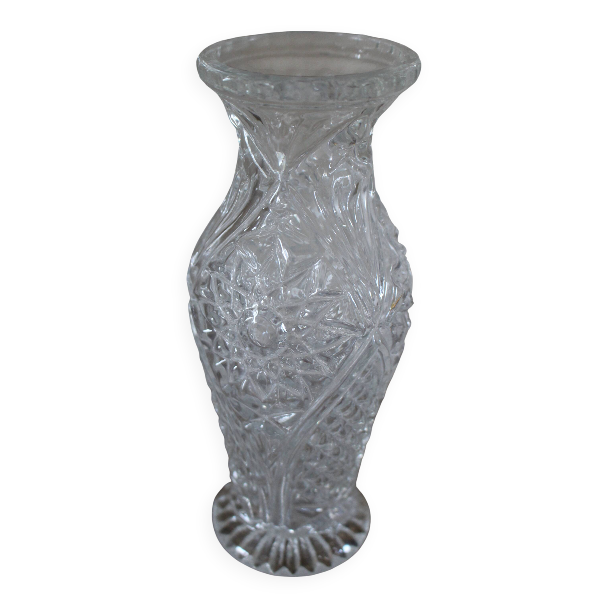 Structured glass vase with curved flowers