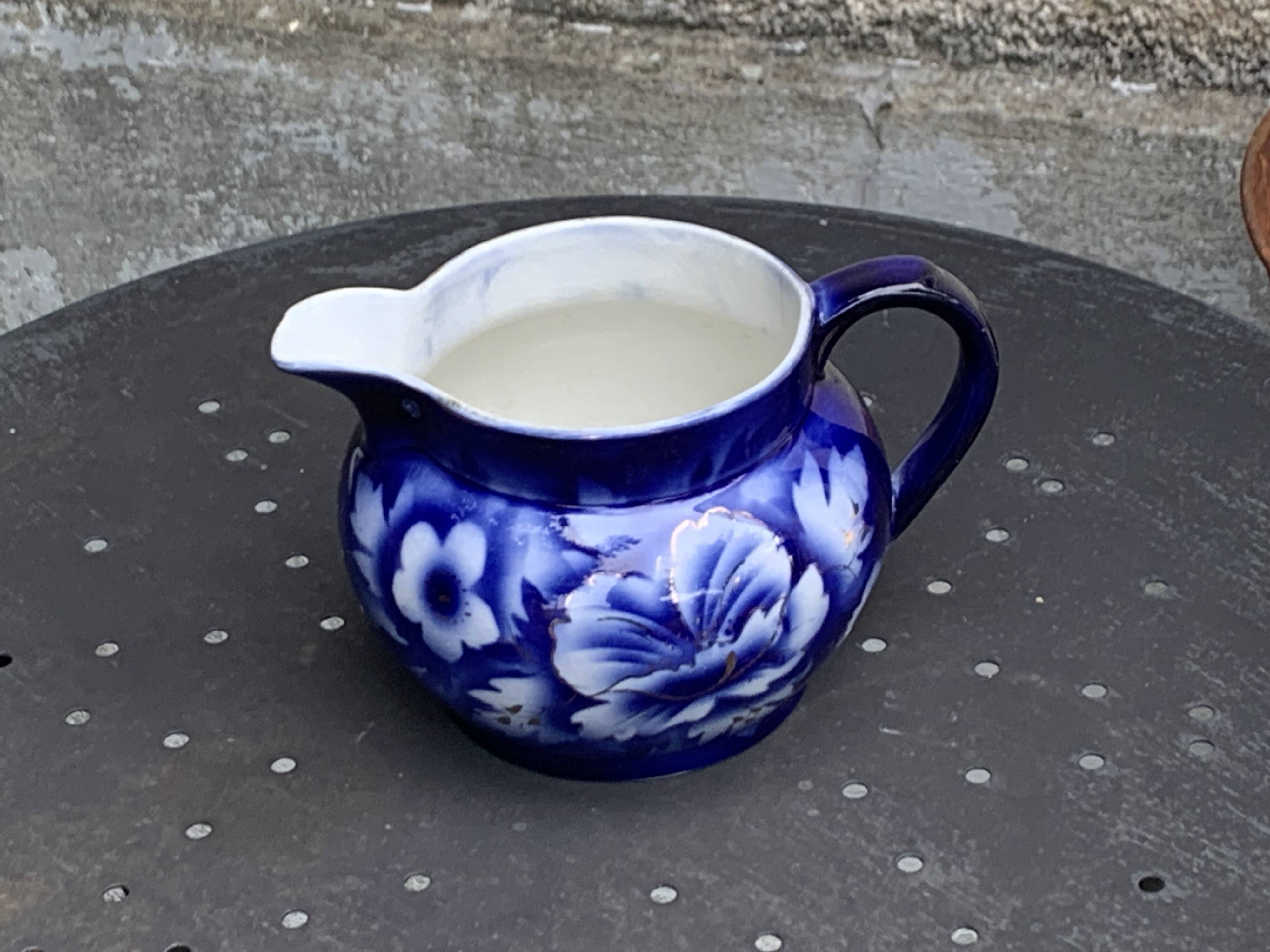 Milk jug with blue and gold peony pattern, made in England,