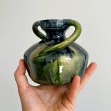Two-handled ceramic vase with a blue and green gradient pattern.