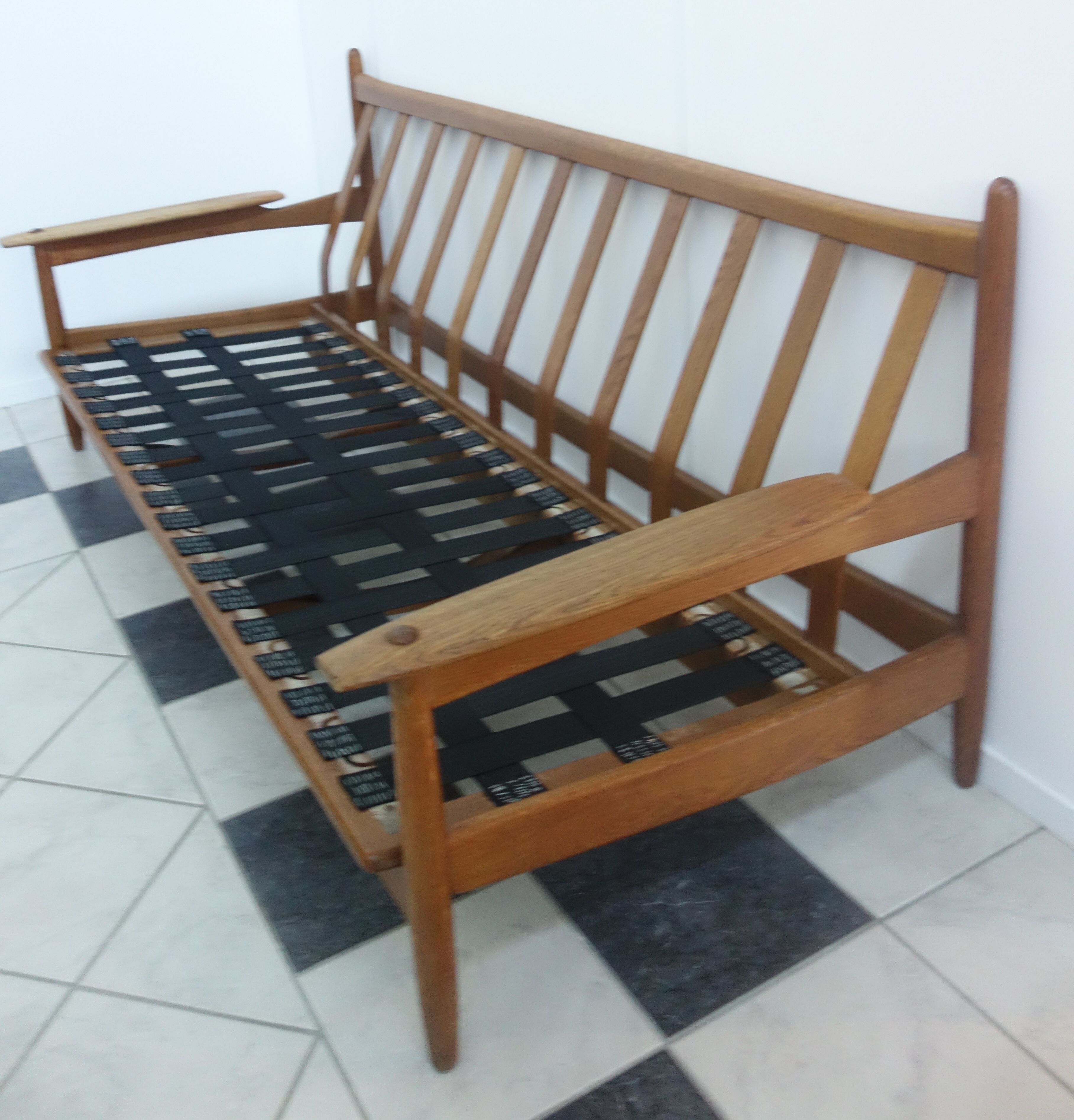 Three seater sofa in fabric and wood