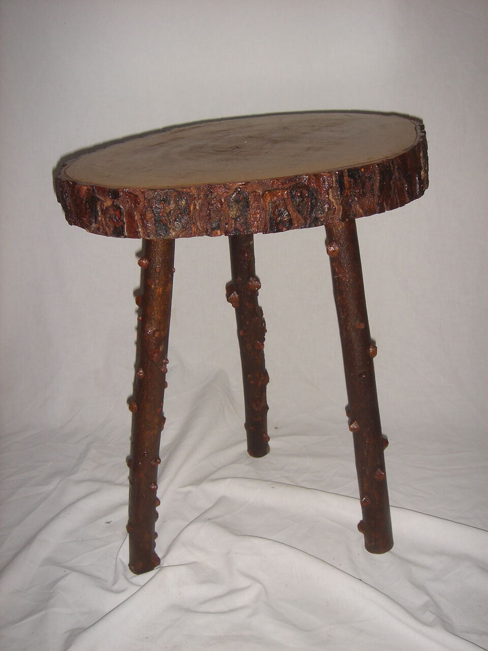 Mahogany table and 2 stools 1970