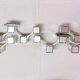 Sciolari, "Cubic" pair of large chrome wall lights, Space Age, Italy 1970