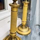 Large pair of empire bronze mercury candlesticks