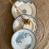 3 mismatched iron earth flat plates in green.