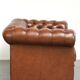 Very spacious 2-seater Chesterfield sofa in cow leather in a English look