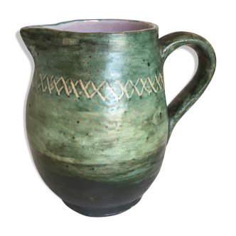 Incised glazed earth pitcher